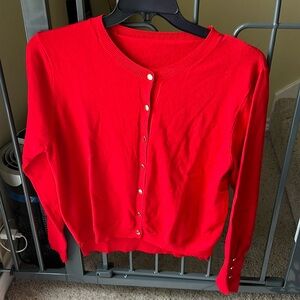 Red Sweater with gold button accents